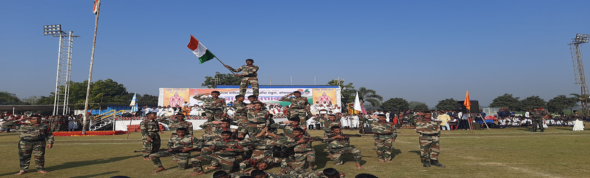NDA Academy cadets forming a pyramid with the national flag